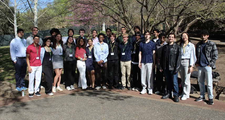 A group of students gathered outdoors